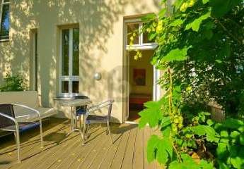 TERRASSEN-WOHNUNG MIT GARTEN & KAMIN
