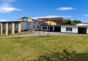 LAGER, WOHNEN & AUTOHANDEL IN EINEM