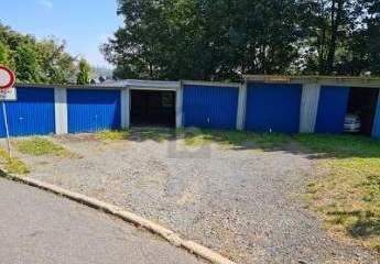 FAKTOR VON 7 MIT GARAGENKOMPLEX UND GRUNDSTÜCK