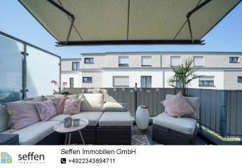 **Stilvolle Neubau-Wohnung mit Süd-Balkon, Einbauküche und Stellplatz in Hürth-Efferen**