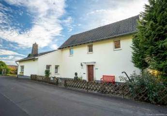 Traumgrundstück mit Weitblick – charmantes Einfamilienhaus im Pleiser Hügelland