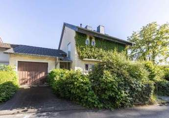 Ruhige Lage, kurze Wege: Wohnen in Oberursel mit Garten, Garagen und Blick ins Grüne