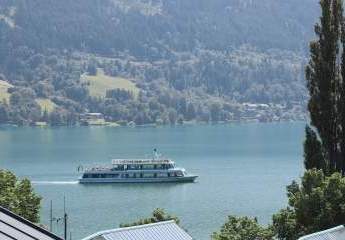 Ihr Logenplatz über dem Zeller See – 4 Zimmer mit Balkon und Traum-Panorama