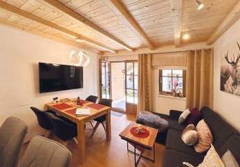 FERIENWOHNUNG – alpiner Wohntraum mit Garten, ihr Rückzugsort in den Bergen mit TOP–Rendite