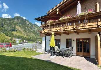 FERIENWOHNUNG – alpiner Wohntraum mit Garten, ihr Rückzugsort in den Bergen mit TOP–Rendite