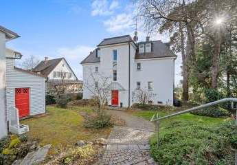 Wohnjuwel mit See-und Alpensicht und traumhaften Garten