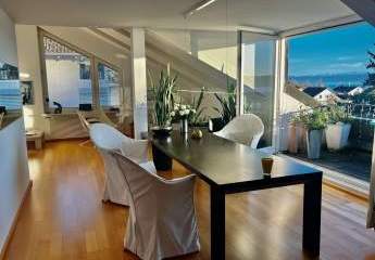 Traumsicht auf See und Alpenkette