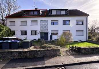 JÄSCHKE - Großzügige 4-Zimmer-Dachgeschosswohnung mit Gartenanteil und Garage