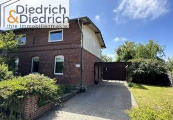 Verkauf einer individuellen Doppelhaushälfte mit Carport und Wiesenblick in Friedrichskoog
