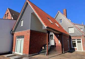 Vermietung einer traumhaften Dachgeschosswohnung - mit Blick auf den Heider Marktplatz