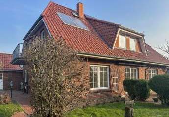 Vermietung eines großzügigen Einfamilienhauses mit Apartment und Gartenvielfalt bei Büsum