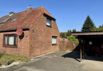 Verkauf einer Doppelhaushälfte in Heide mit Garten und Doppelcarport