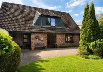 Einfamilienhaus in Lohe-Rickelshof: Sackgassenlage, zentrumsnah, mit Garten zu verkaufen