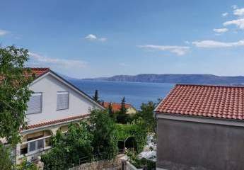 Wohnung mit überdachter Terrasse und Meerblick