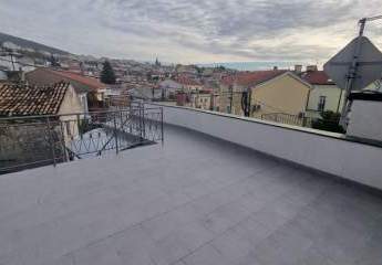 Stadthaus mit Dachterrasse und Meerblick