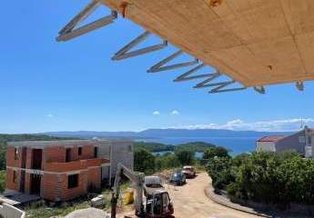 Moderne Maisonettewohnung mit Pool und Blick auf das Meer