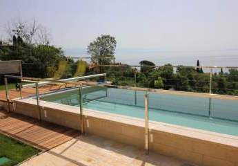 Erdgeschosswohnung mit Garten und Pool