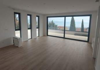 Modernes Appartement mit Garten und Meerblick