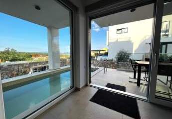 Moderne Maisonettewohnung mit Garten und Swimmingpool
