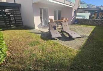 Erdgeschosswohnung mit Garten und Blick auf das Meer