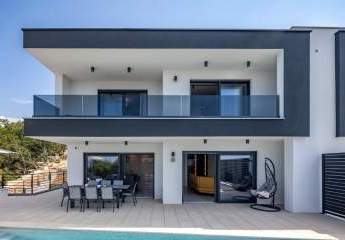 Moderne Doppelhaushälften mit Swimmingpool und Meerblick