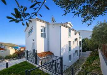 Neue Appartements in EG, OG und DG nahe dem Strand