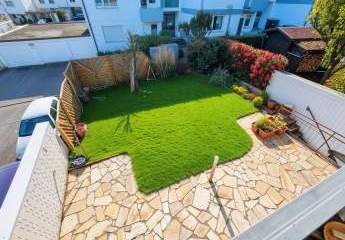 Garten-Wohnung im Reihen Endhaus, helle 3,5 Zimmer, Terrasse + Garage + Platz