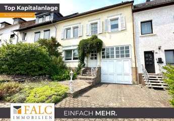 Sonnenhelles Zweifamilienhaus mit separatem Werkstattgebäude!