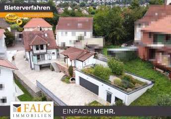 Exklusive Doppelhaushälfte mit Saunahaus und großer Garage