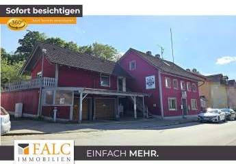 Einfamilienhaus mit ETW, Garten und Doppelgarage