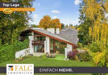 Moderne Architektur trifft Gartenidylle – Doppelhaushälfte mit Wellnessbereich in Grünwald