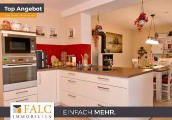 Einfach Mehr: Gepflegte Erdgeschoss-Wohnung, Garten, Teich, 2Garagen, PKW-Stellplatz. PV-Anlage u.a.