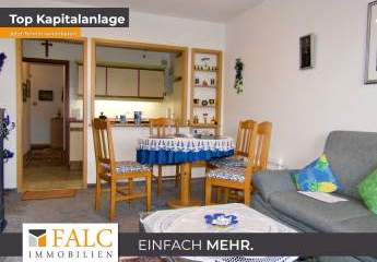 Einfach Mehr: Gepflegte Nichtraucher-2-Zimmer-Wohnung, möbiliert, TG, Aufzug, Süd-Loggia-Balkon.