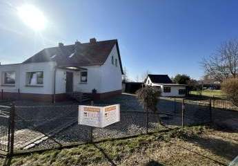 Sanierungsbedürftige Doppelhaushälfte + mögliches Baufeld