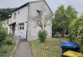 Kleines gemütliches teilsaniertes Reihenendhaus mit schönem Garten in ruhiger Lage