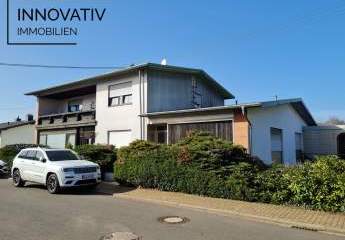 Großes Areal mit 480 m² Wohnhaus Ein-Dreifamilien und  2 Lagerhallen in ruhiger Lage von Urexweiler