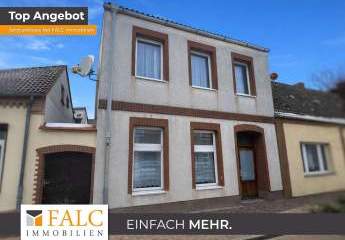 ***Reihenmittelhaus mit Entwicklungsmöglichkeiten und Gartenfläche***