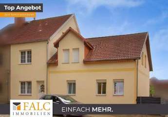 Effizienz pur: Gedämmter Altbau mit neuerem Dach & modernem 2000er-Anbau