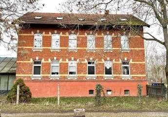 Mehrfamilienhaus mit 5 Parteien: Gute Raumaufteilung, helle Räume.