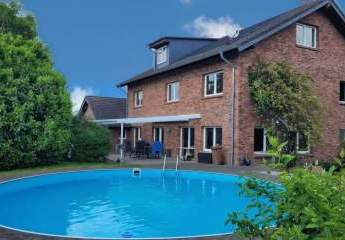 A+ Einfamilienhaus mit Wärmepumpe, Einliegerwohnung (ca. 75 m²) separat vermietbar, XL-Garage & Pool