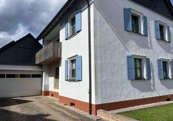 Großzügiges Einfamilienhaus mit Gewerbe, Doppelgarage und großem Grundstück!