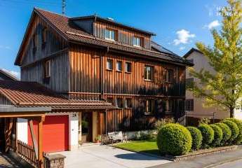 Ruheoase im Grünen – 3-Familienhaus mit Wohlfühlcharakter