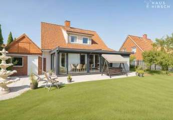 Gepflegter Familientraum mit großem Wintergarten und Südgarten