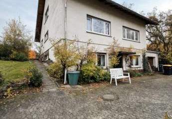 Sanierungsbedürftiges Ein- bis Zweifamilienhaus mit großem Garten