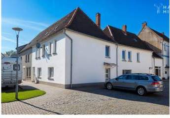 Mehrfamilienhaus als lukratives Sanierungsobjekt.