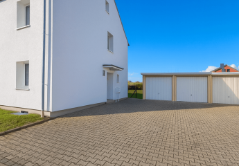 Investmentpaket: 11 Reihenhäuser, 23 Einheiten, 9 Garagen - Eine einzigartige Gelegenheit!