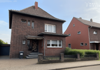 Familienfreundliches Zweifamilienhaus mit schönem Gartenparadies