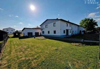 Generationenhaus mit 2 Garagen - Perfekt für die ganze Familie! Gemütliche Atmosphäre, ideale Lage.