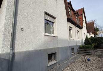 Doppelhaushälfte mit großem Grundstück und Bauplatz