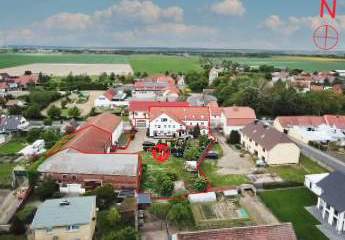 Mehrfamilienhaus mitten in Nedlitz mit großem Hof, Grünanlage und XXL Ausbauscheune